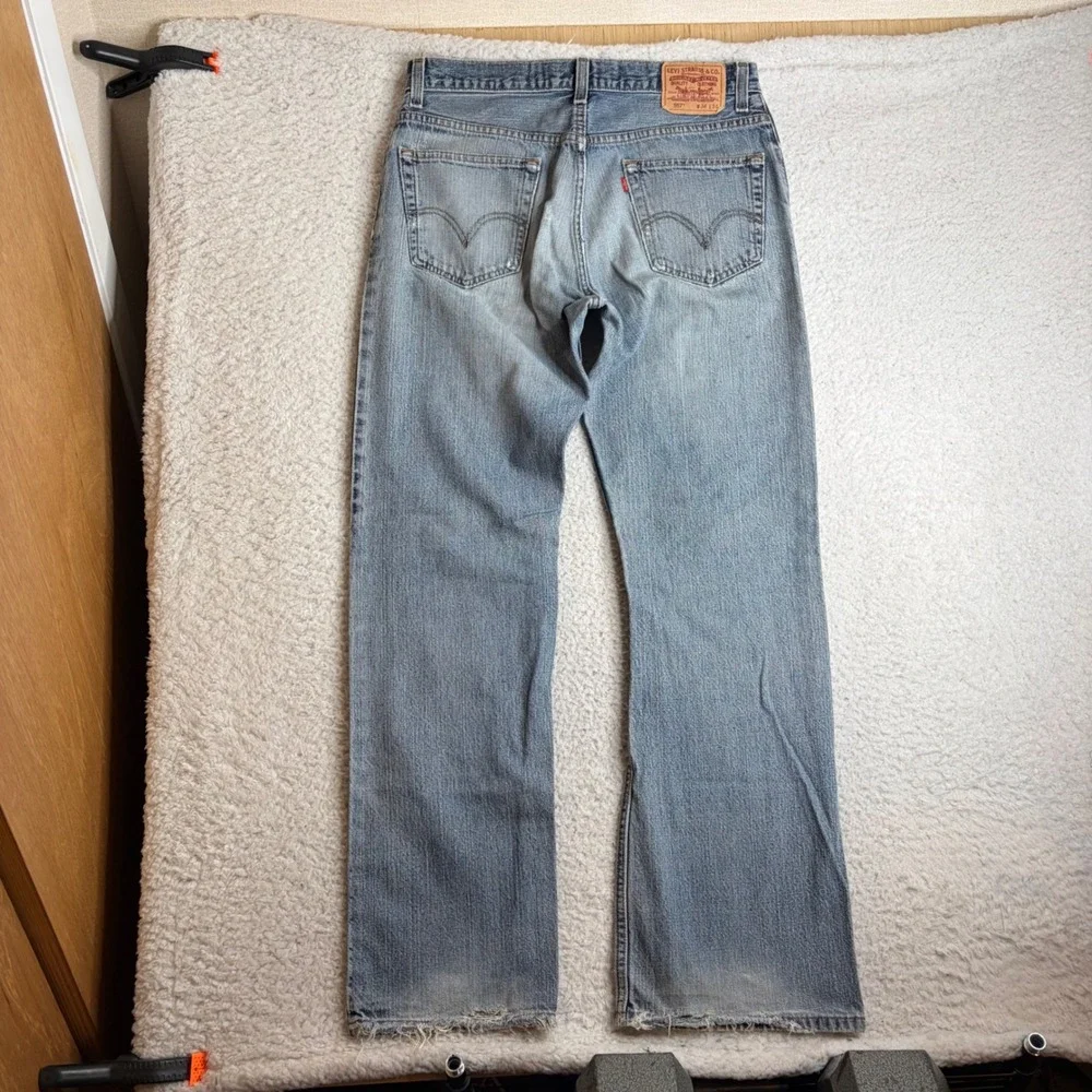 Y2K Levis 557 Relaxed Bootcut Jeans Mens 34x34 Light Wash Distress Denim FADE